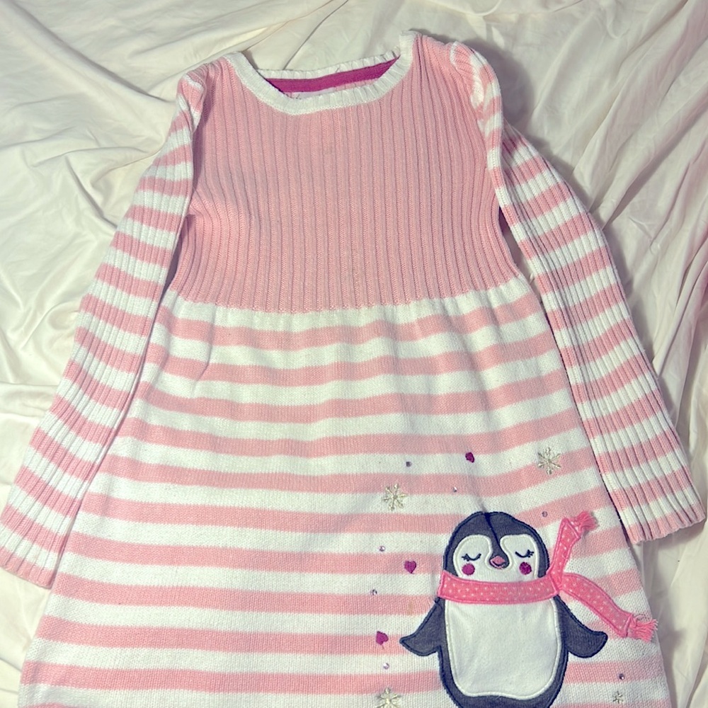 Girl’s pink and white striped penguin dress